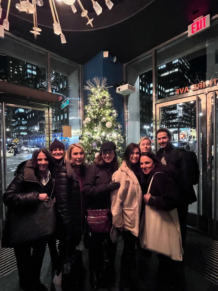 OpAD Media team members together during a New York City company outing team dinner