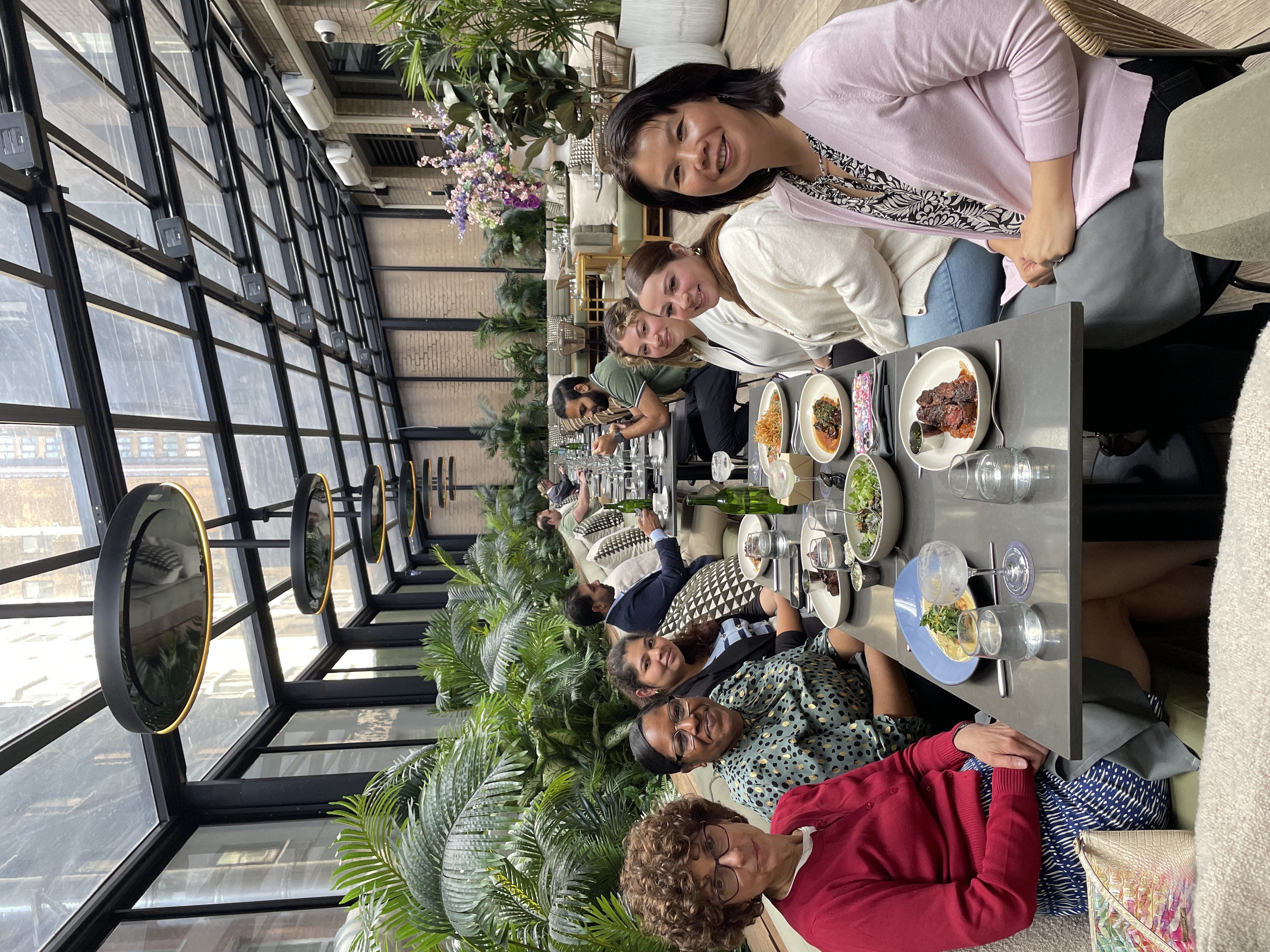 OpAD Media employees sharing a team meal during a company gathering