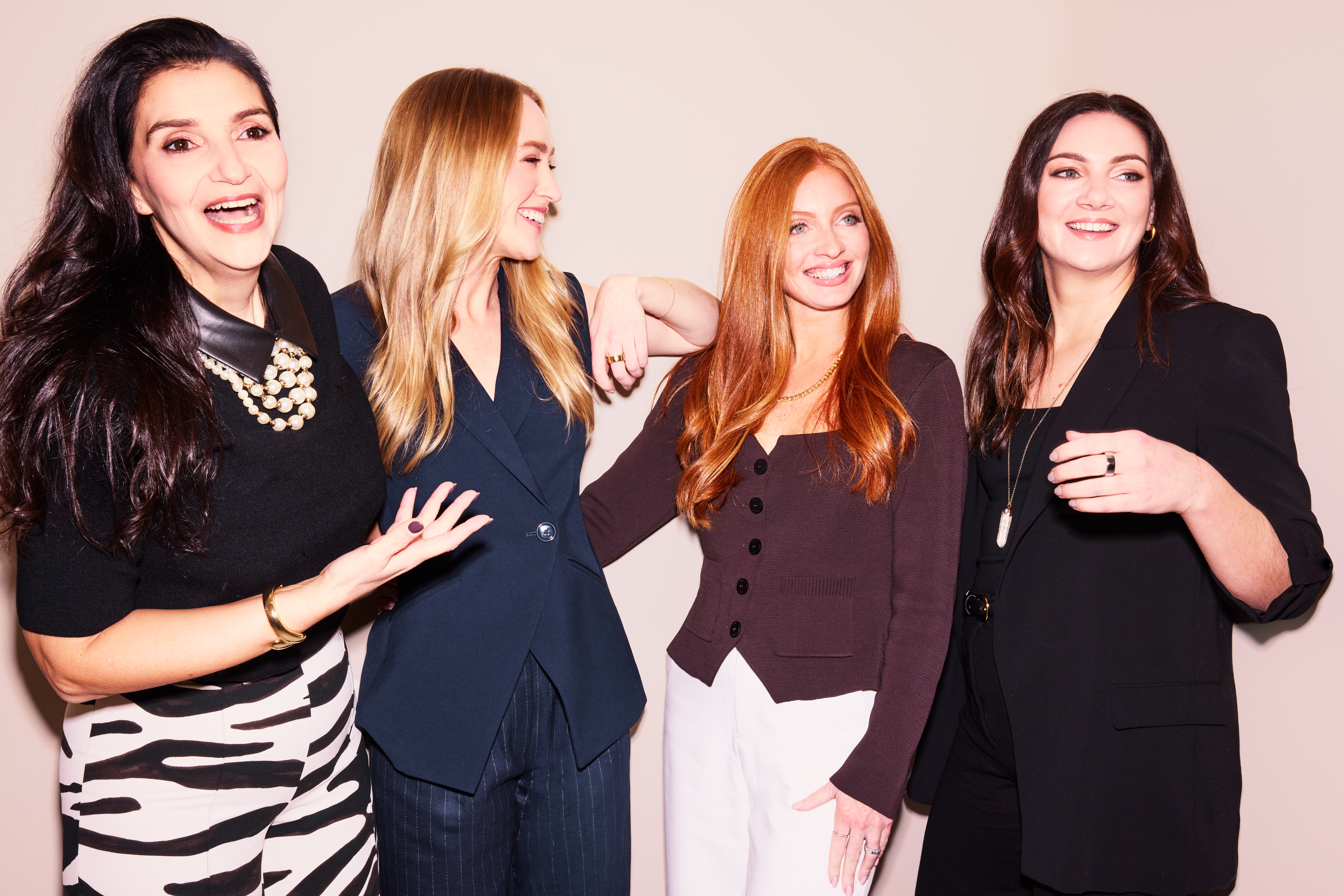 OpAD Media women-led leadership team in a candid professional portrait